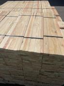 1" x 1" square wood nursery stakes milled from Douglas Fir in a pallet